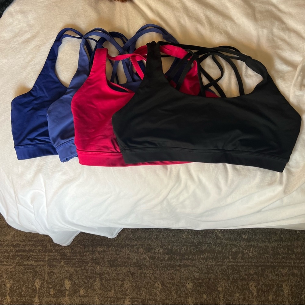 Lot of 4 Lululemon Energy Bras - Hot Pink, Delphinium, Blue/Purple and Black